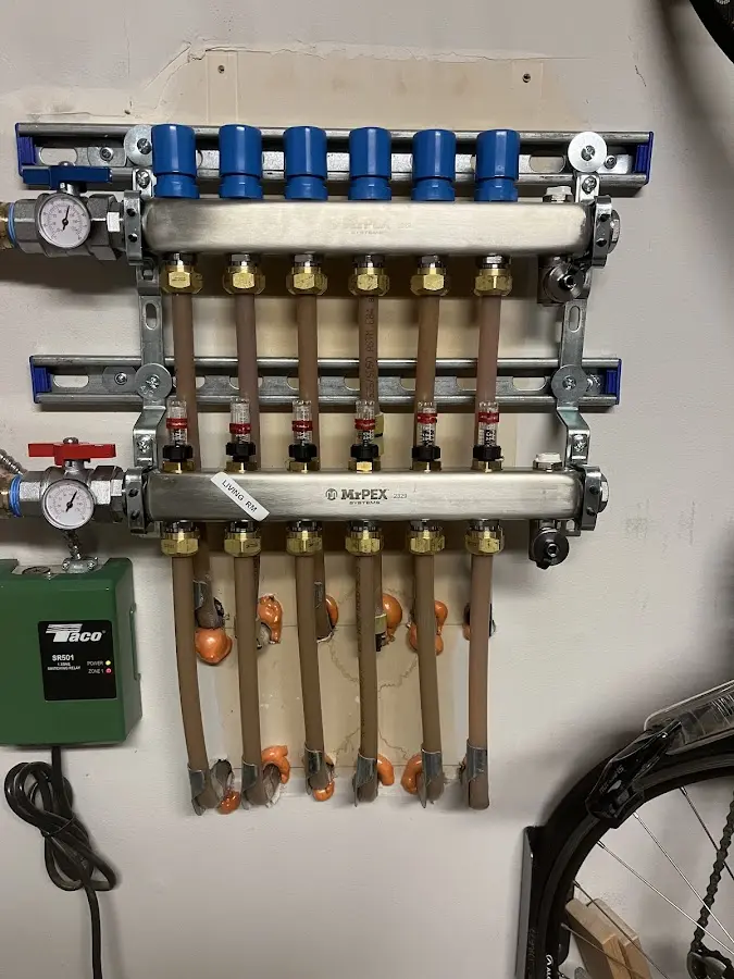 Plumber performing Gas Leak Detection at a residential property in Beecher